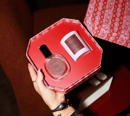 Celia Loves gift set with room spray and candle in red packaging