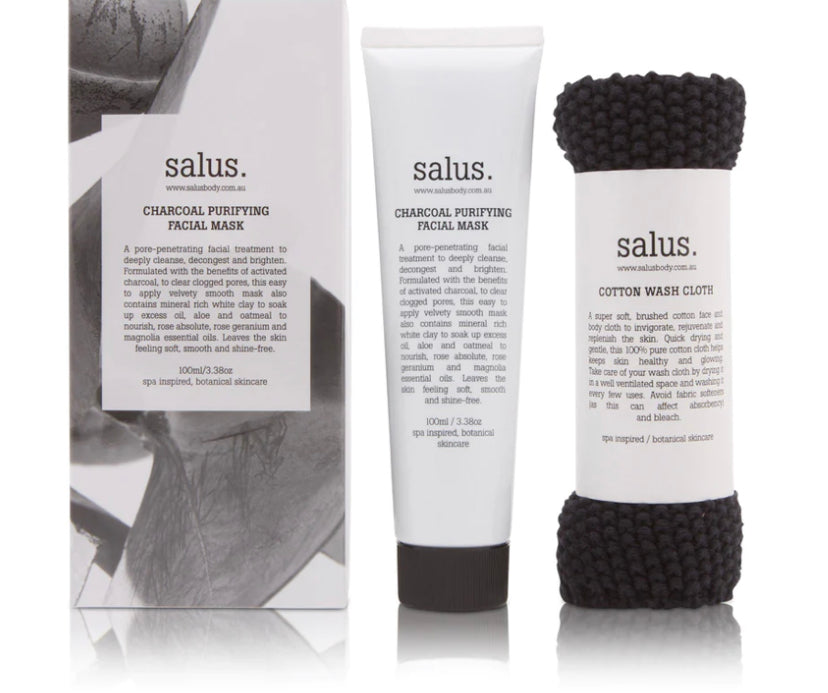 Salus charcoal purifying facial mask with packaging and cotton wash cloth on a white background