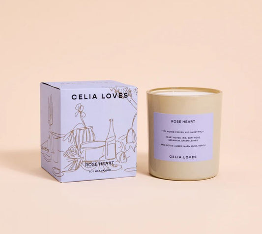 Cela Loves candle and packaging on a beige background