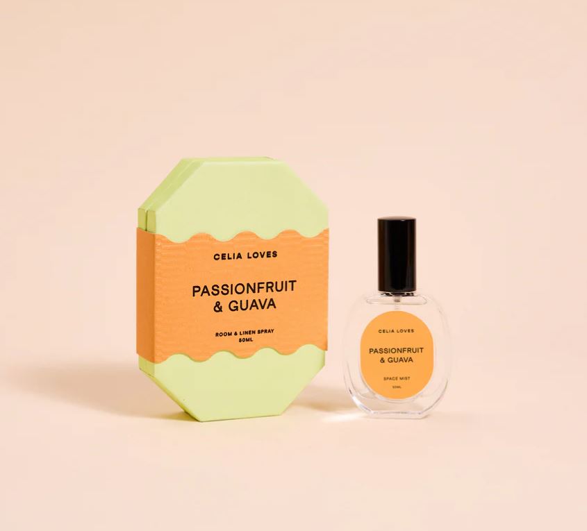Celia Loves Passionfruit & Guava room and body spray on a beige background