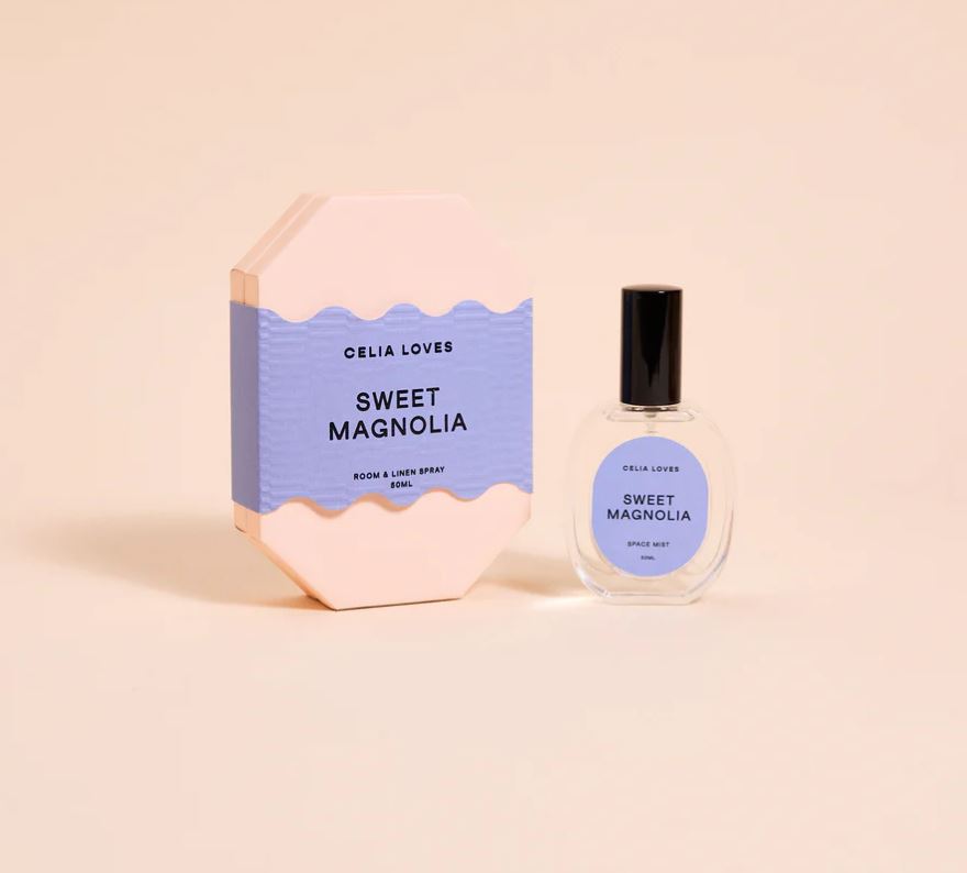 Celia Loves Sweet Magnolia room and linen spray on a beige background