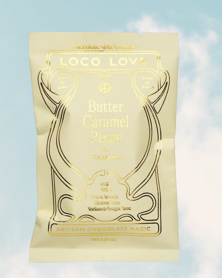 Packaged chocolate bar with 'Loco Love' branding on a light blue background