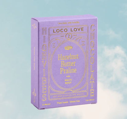 Purple packaging of Loco Love High Vibes Chocolate with gold text on a light blue background