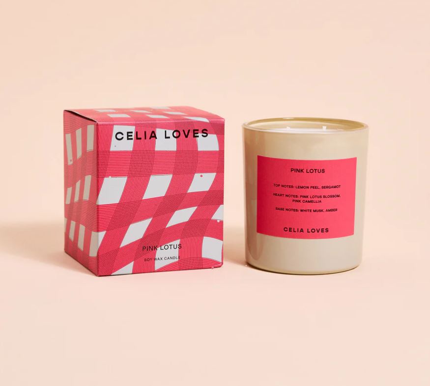 Celia Loves Pink Lotus candle and packaging on a beige background